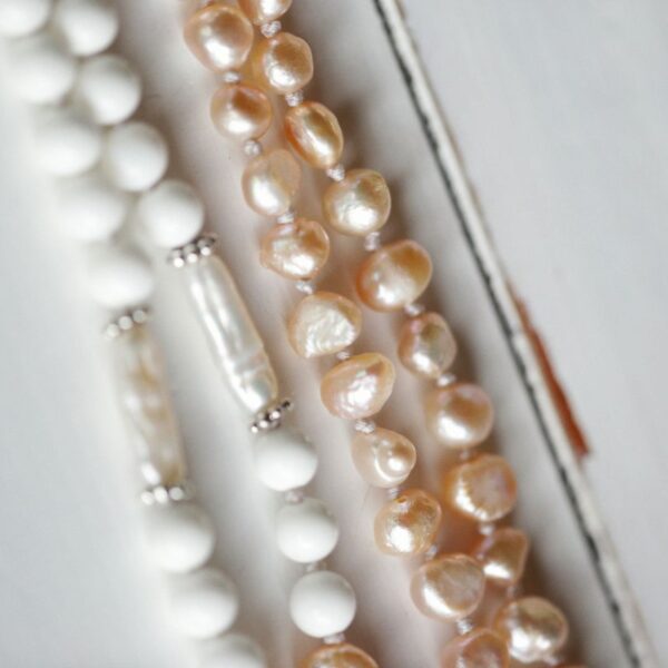 Pearl and white bead strand necklace
