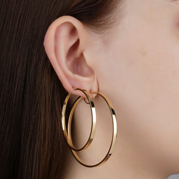 Large gold-tone hoop earrings