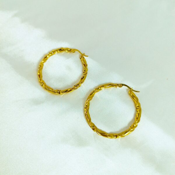 Twisted gold-tone hoop earrings