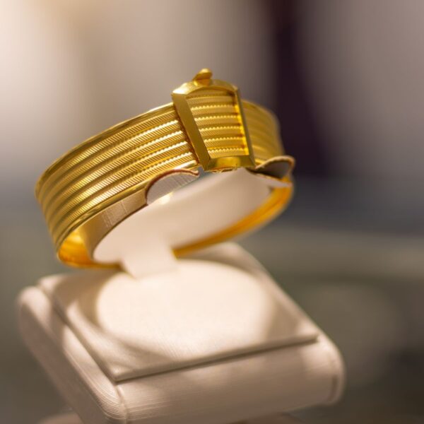 Wide ridged gold-tone cuff bracelet