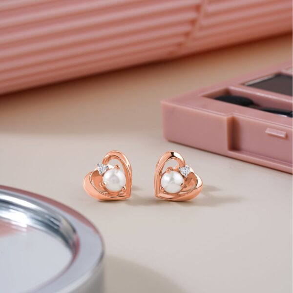 Rose gold-tone heart pearl stud earrings