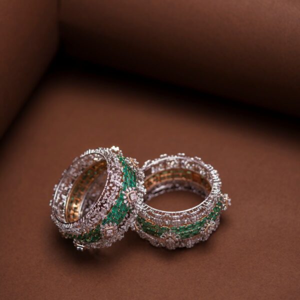 Wide crystal and green stone bangle pair