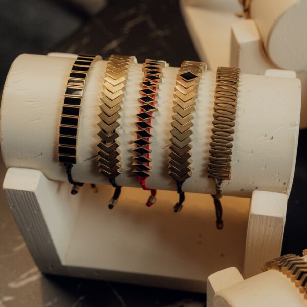 Black and gold-tone enamel chevron bracelet