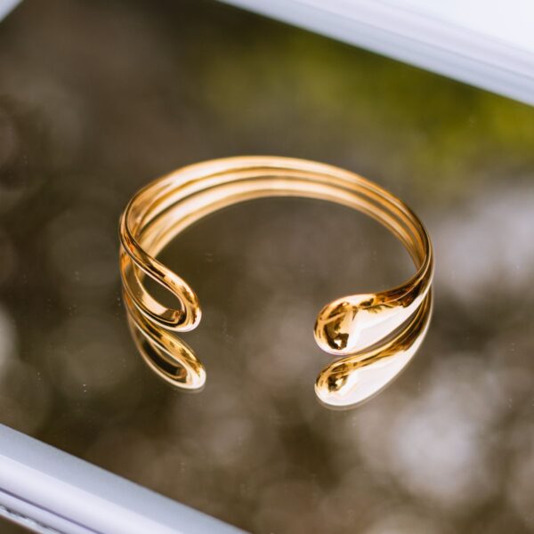 Gold-tone twist open cuff bracelet