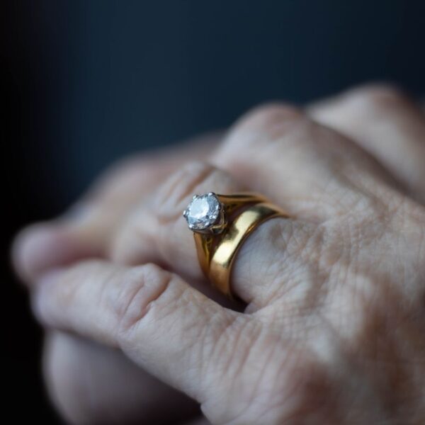 Gold-tone solitaire crystal ring